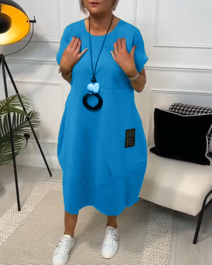 Maura | Relaxed Pocket Midi Dress